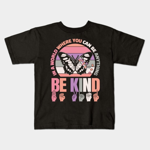 In world where you can be anything Kids T-Shirt by aneisha